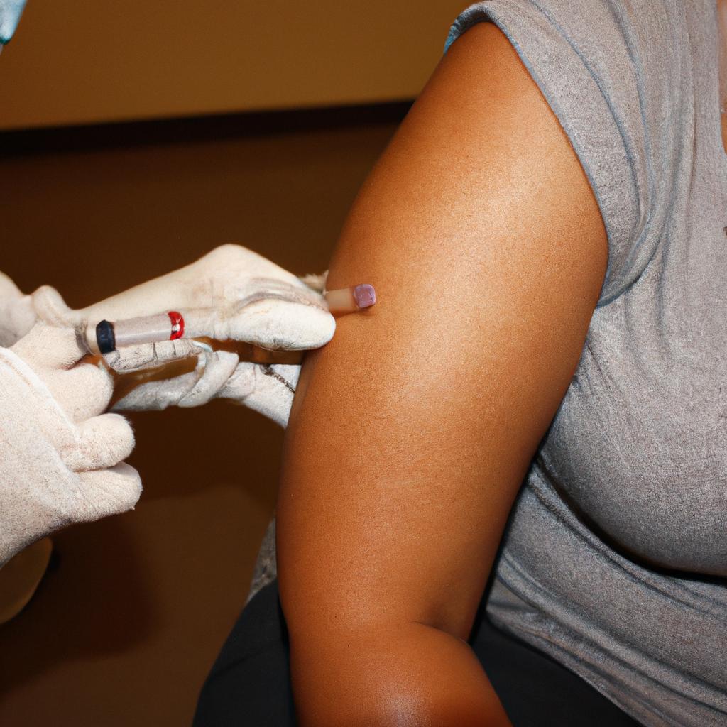Person receiving vaccine from doctor